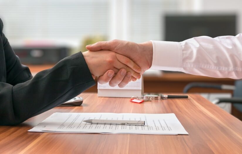 Two Persons Handshaking On A Deal